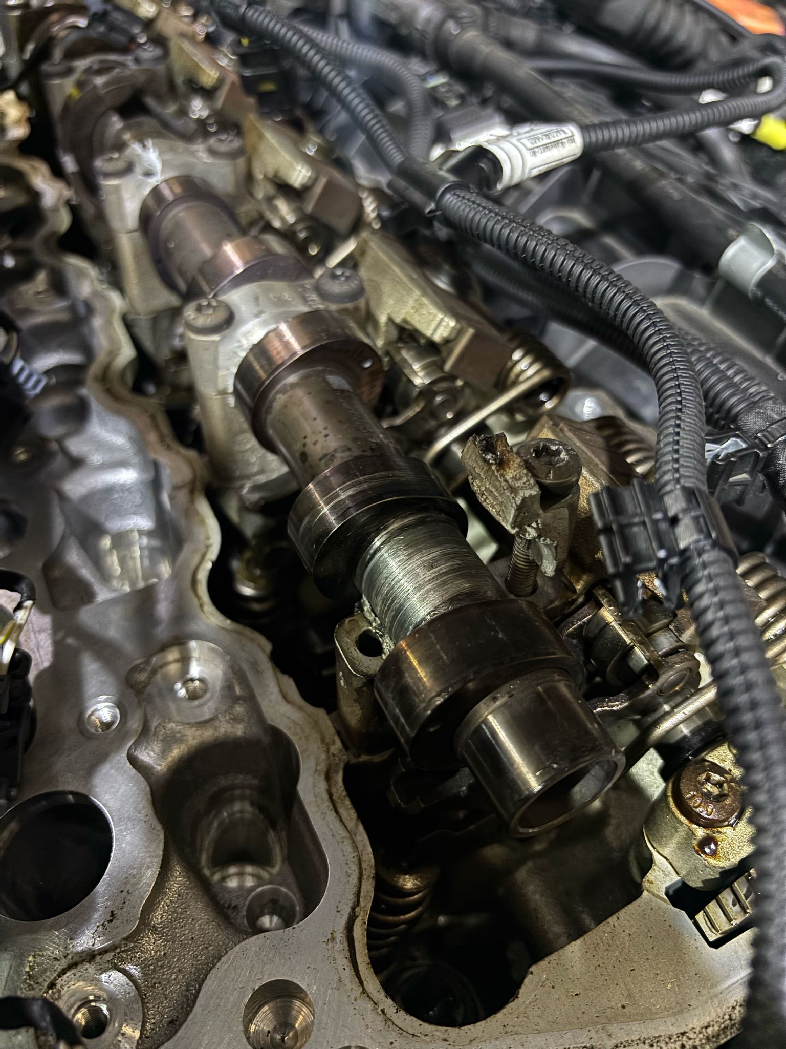 Engine showing camshafts, and valves during disassembly