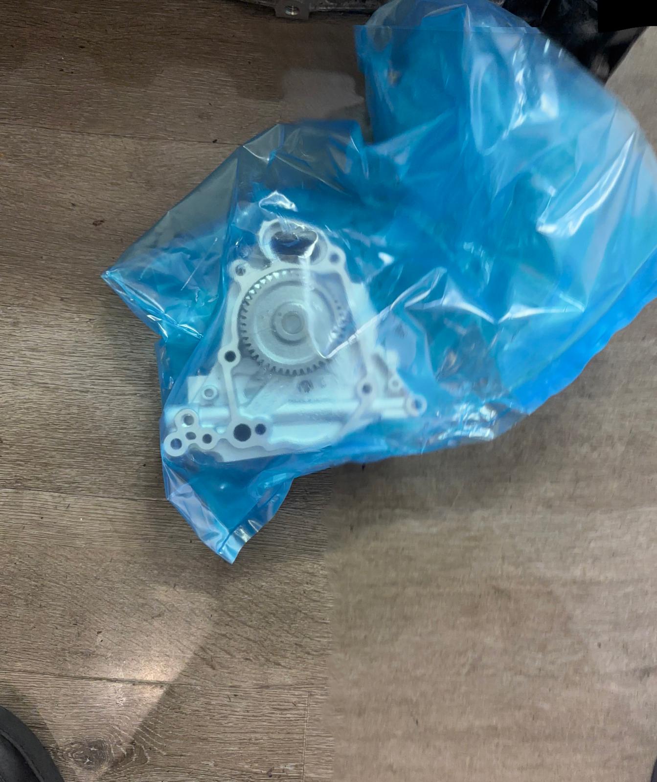 New oil pump in bag