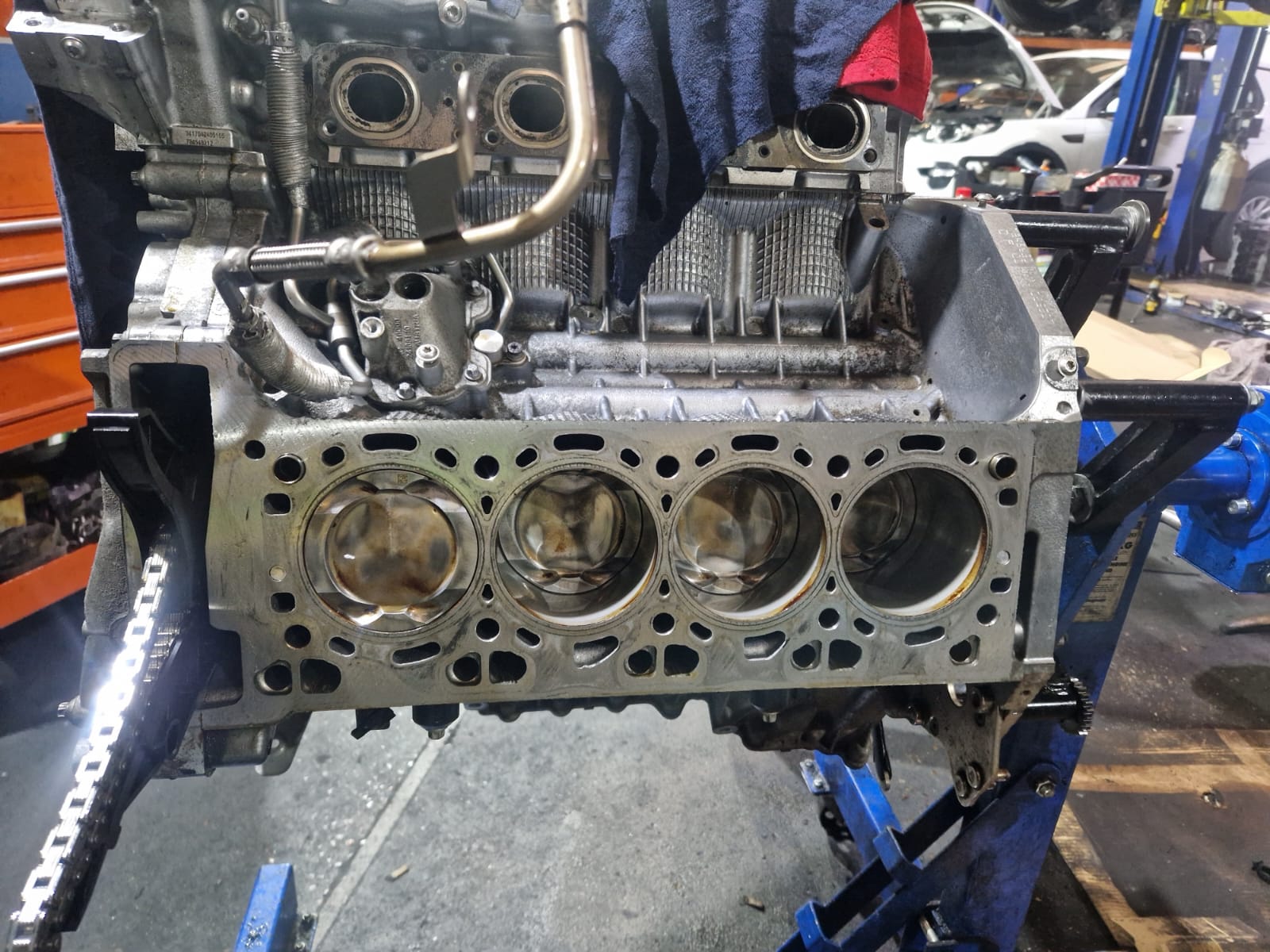 S63 block, pistons visible.